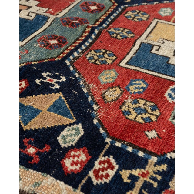 A beautiful hand-knotted rug, traditionally crafted by skilled artisans using fine-quality wool. The hand-knotted...