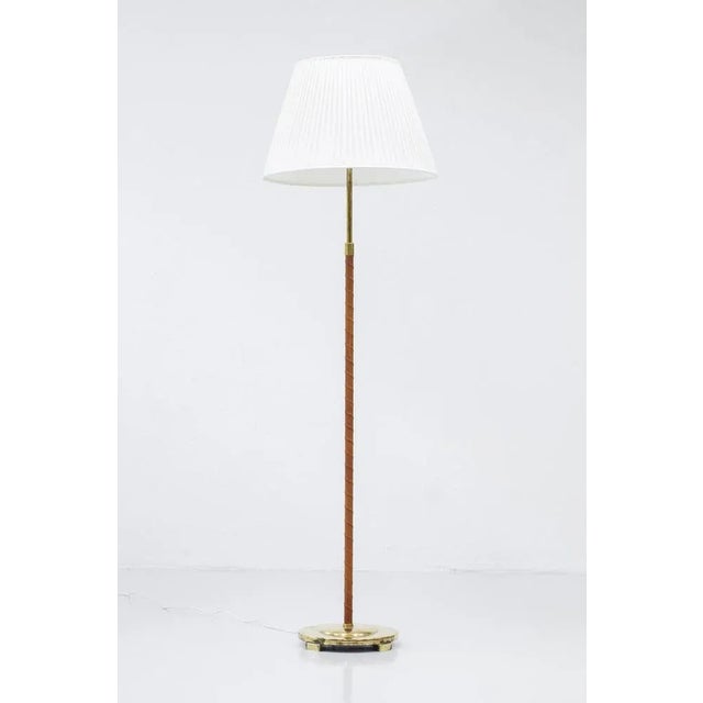 Floor lamp model 32753 produced by Nordiska Kompaniet. Attributed to the head designer for the NK lighting department...