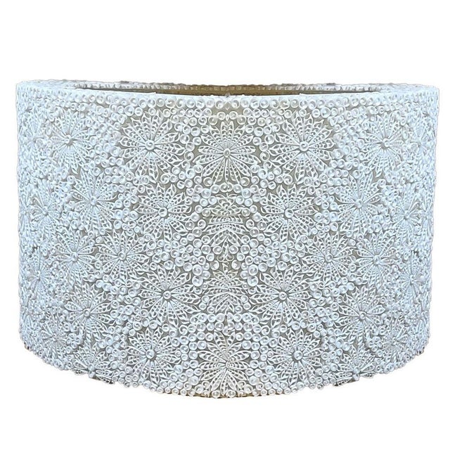 Large 48" diameter resin seashell organic drum shade chandelier featuring a large drum made of sea shells fixed in place...