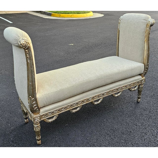 Featured is a remarkably elegant Vicente Wolf Collection Custom Neoclassical Style Silver Gilt Window Bench. Fit for a...