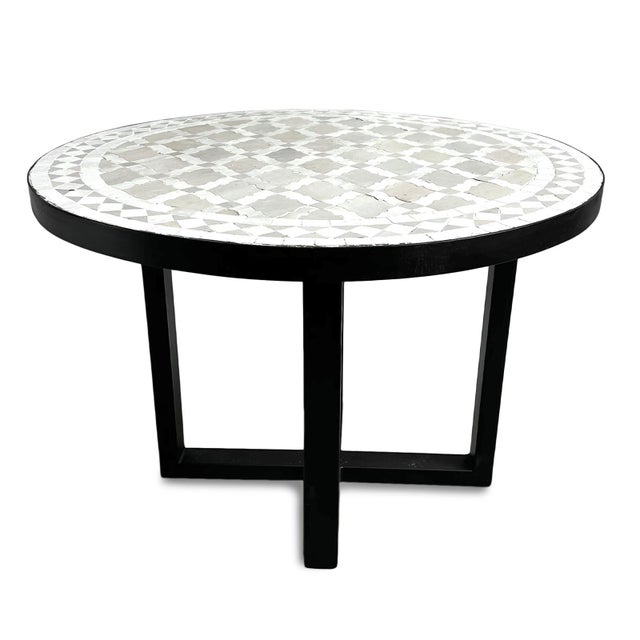Beautiful outdoor or indoor hand crafted Moroccan tile round side table. Matte black iron X base and removable top with...