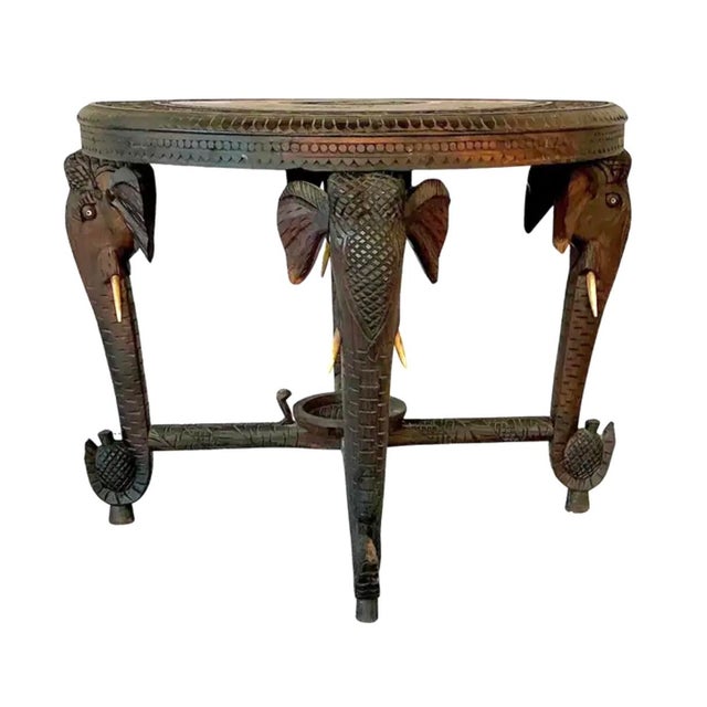 Vintage Anglo-Indian Side Table showcases hand-carving and symbolic decoration, reflecting India's long tradition of...