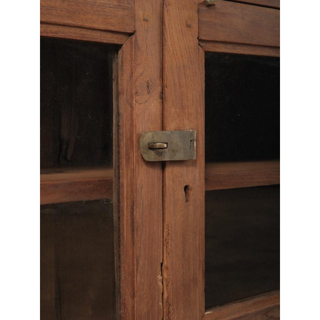 Indian Late 20th Century Indian Teak Wood Wall Cabinet With Glass Doors and Original Hardware For Sale - Image 3 of 6