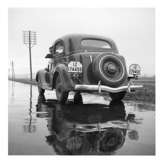 with the Ford V8 on a Wet Street, 1930, Photographic Print For Sale