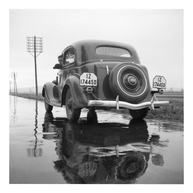 with the Ford V8 on a Wet Street, 1930, Photographic Print For Sale