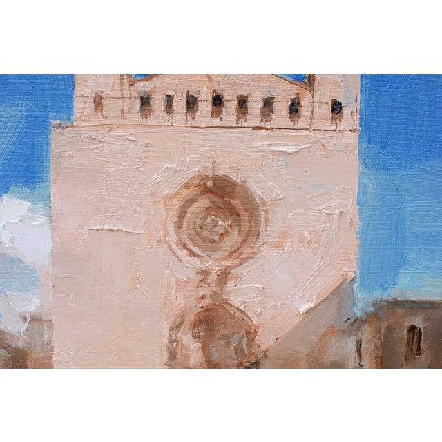 The painting depicts a sunlit church in Palma de Mallorca, characterized by its striking façade and bold geometric forms....