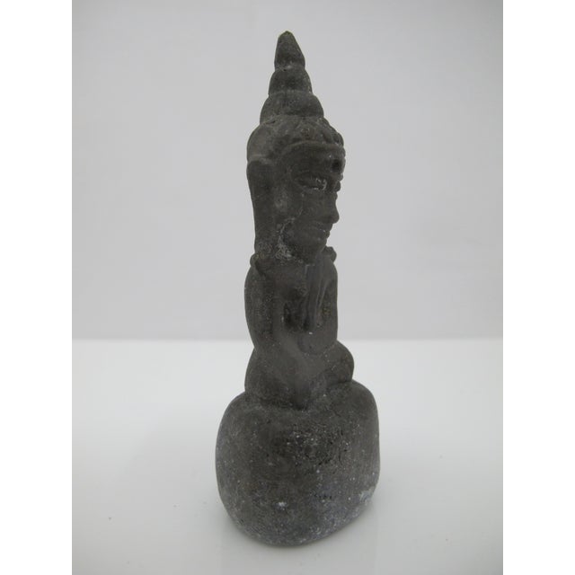 Thai Ayutthaya style bronze Buddha figurine. Figure seated in meditational pose with one hand to the earth. Antique with...