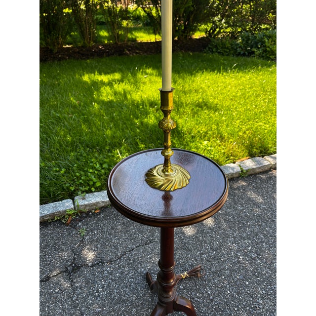 Beautiful Vintage Mahogany Queen Anne style fixed lamp on table with turned details and decorative brass lamp base. Lovely...