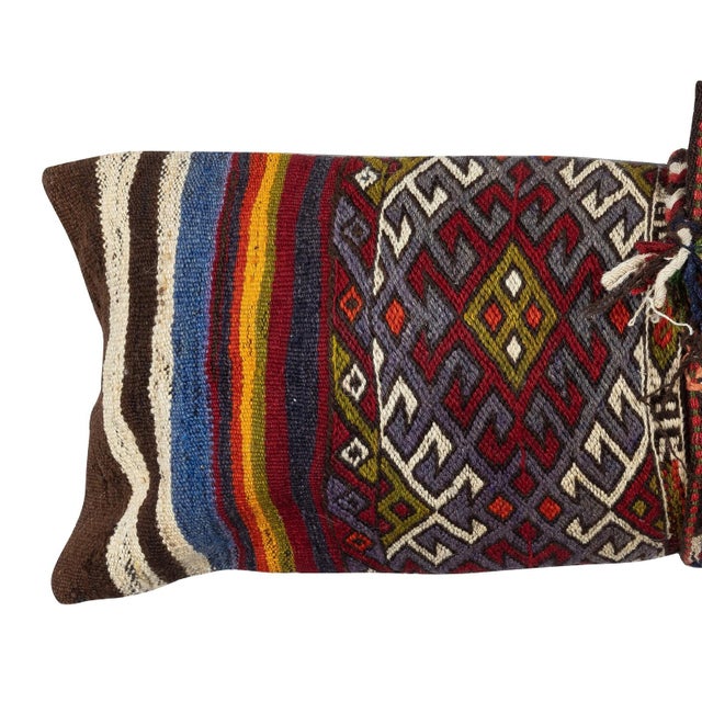 Add a touch of history and warmth to your space with this vintage handmade Turkish wool kilim cushion cover. Crafted from...