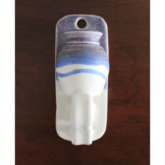 Vintage blue and white studio art pottery pocket planter or vase. Signed by artist. Ready to hang. Minor age wear. No chips.