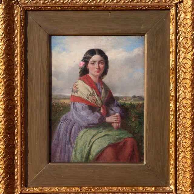 A very attractive mid-19th century oil on canvas Romantic Realist landscape portrait of a beautiful young woman, signed...