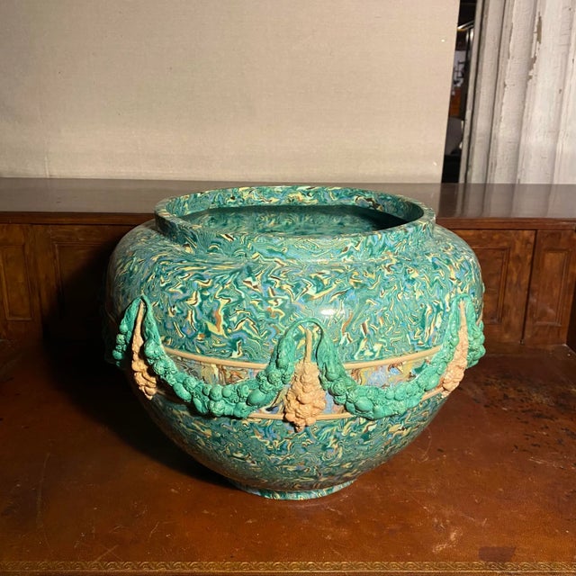 Pichon in Uzes France created wonderful pottery with piped embelishment and glorious marbled glazes. This is a rare 19th...