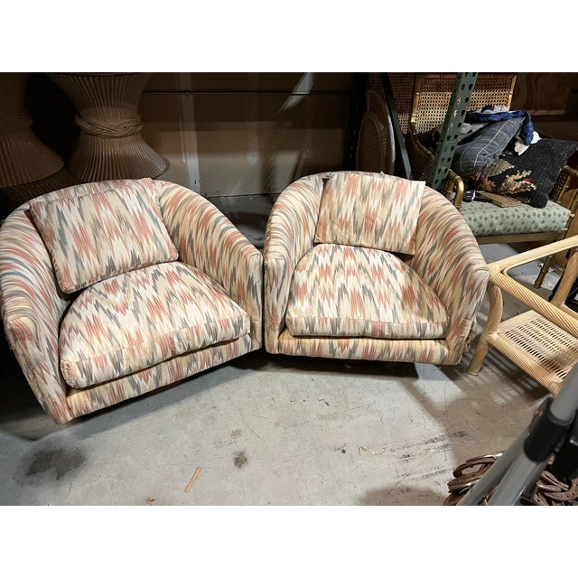 Up for consideration is a beautiful pair of Milo Baughman wooden swivel chevron chairs. These would look lovely in your...