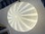 Authentic vintage table lamp by Mazzega, featuring a sculptural ovoid (egg-shaped) form in hand-blown Murano glass. The...