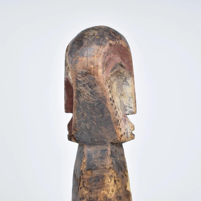 Colorful Double Face figure by Metoko. The Metoko wood figures are defined by their highly abstracted forms including...