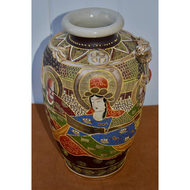 Vintage (1940's) Vase has a Satsuma Style with Moriage Painting. Made of Pottery/Porcelain. Made in Japan. The...