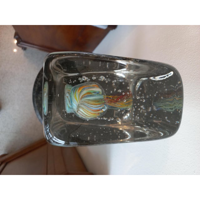 Aquarium, brick, sculpture, made of a single block of glass with the presence of jellyfish inside. Object made by hand so...