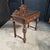 This English Oak Heavily Carved Console Table With Drawer has bulbous front legs and griffin carvings on the backsplash...