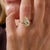 This exceptional modern engagement ring is centered by a GIA-certified pear shape diamond weighing an impressive 5.19...