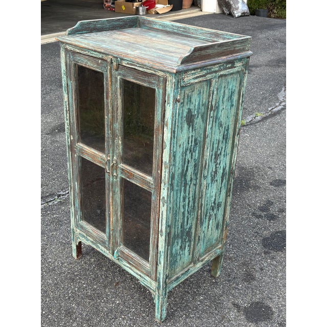 Beautifully crafted early 20th C. Two-Door Display Cabinet with an exceptional artisan paint finish. Significant...