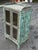 Beautifully crafted early 20th C. Two-Door Display Cabinet with an exceptional artisan paint finish. Significant...