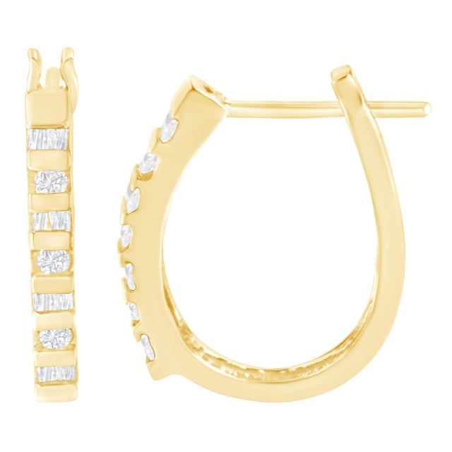 You will fall in love with these unique hoop earrings. A must have for any serious jewelry collection, these 10K gold...