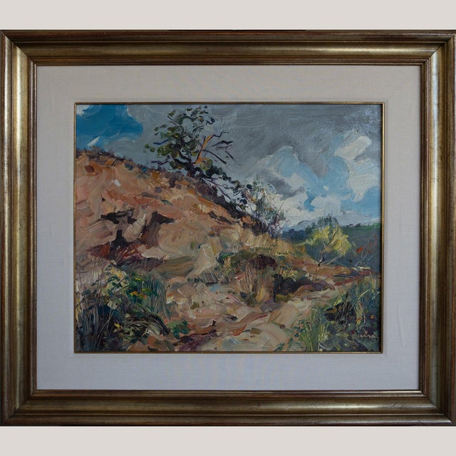 This evocative landscape by Jordi Pausas Mestres showcases a rugged hillside beneath a brooding, windswept sky, painted in...