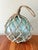 Authentic handblown glass fishing float buoy in beautiful coastal blue-green color. Unsure of origin and original glass...
