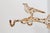 Vintage garden decor with perched bird and decorative hook. Includes hanging hardware.