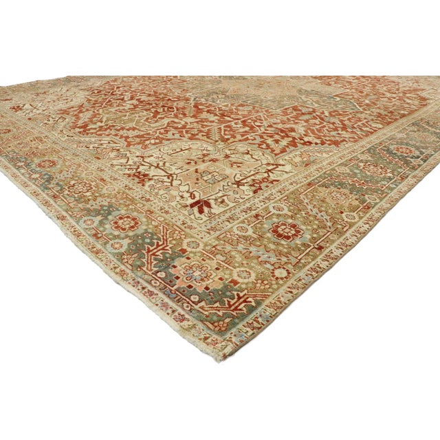 53172 Distressed Antique Persian Heriz Rug, 11'02 x 14'02. Persian Heriz rugs are esteemed handwoven carpets originating...