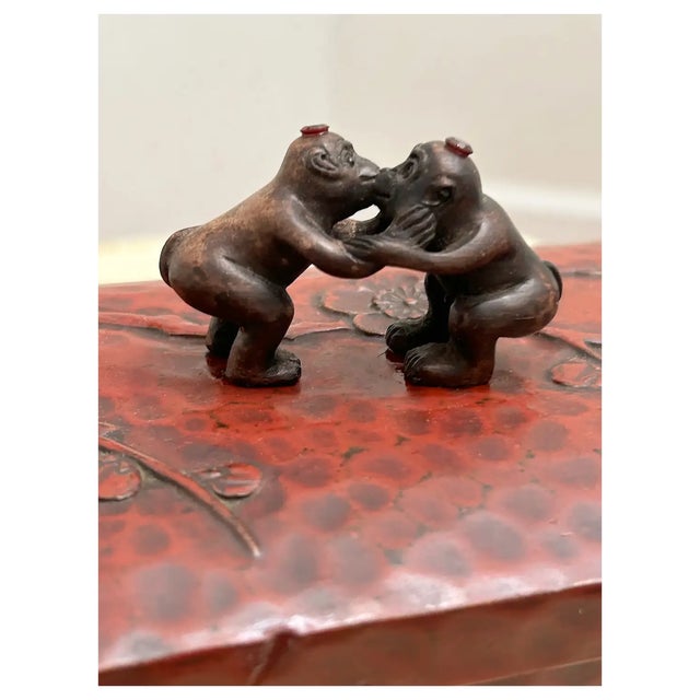 1930s Japanese hand carved lacquer box with cherry blossoms. I added the vintage Netsuke Monkeys to the lid and natural...