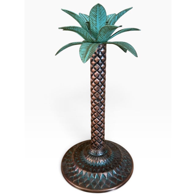 Striking vintage palm tree candle holder sculpted entirely in metal, with an exuberant tropical silhouette and richly...