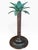 Striking vintage palm tree candle holder sculpted entirely in metal, with an exuberant tropical silhouette and richly...