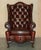 Vintage Chesterfield Wingback Armchairs and Footstools in Oxblood Leather, Set of 4 For Sale - Image 3 of 18