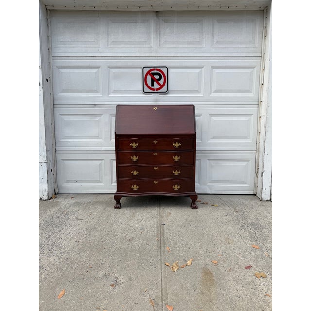 We have an absolutely beautiful vintage Chippendale style secretary desk for sale. Featuring a rich mahogany finish,...