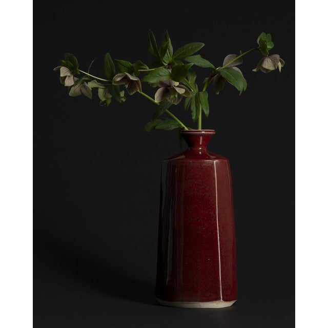 A striking Shigaraki stoneware vase by Atsushi Yuba, made in Japan in the 1980s. The piece reworks the classic bottle form...