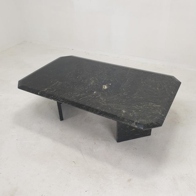 Very nice Italian coffee table handcrafted out of marble, 1970's. The rectangle top and the base are made of very...