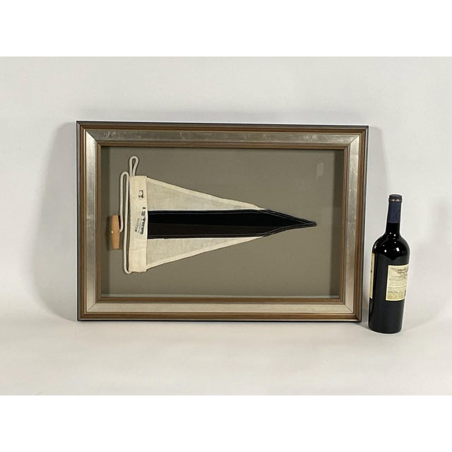 Nautical signal flag representing "third substitute". The flag has a sturdy canvas hoist that is fitted with a manila hemp...