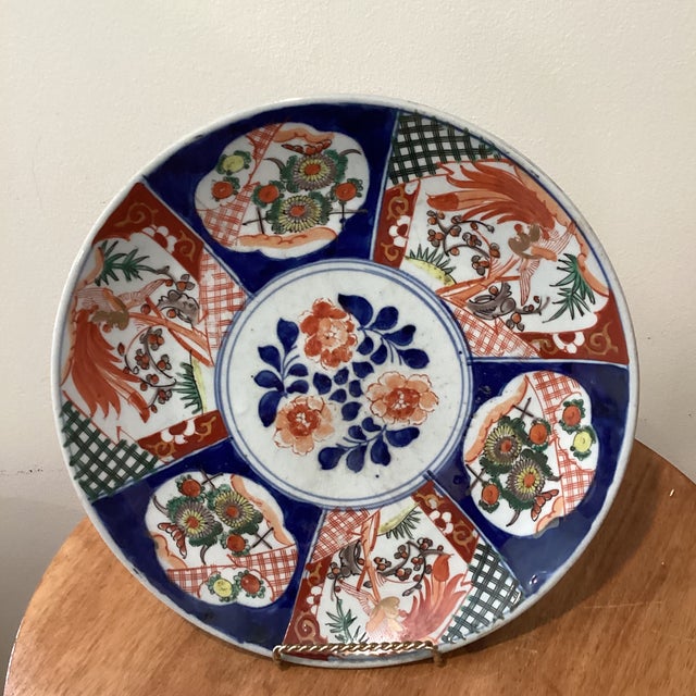 This Antique Japanese Imari Porcelain Hand Painted Platter/Charger is a beautiful and authentic piece of Asian antiques....