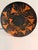 A striking pair of large vintage handmade copper decorative plates from Chile, each measuring approximately 15 inches in...