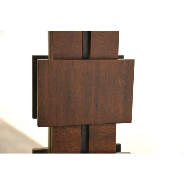 A mid century modern walnut brutalist style mirror by Lane Furniture.