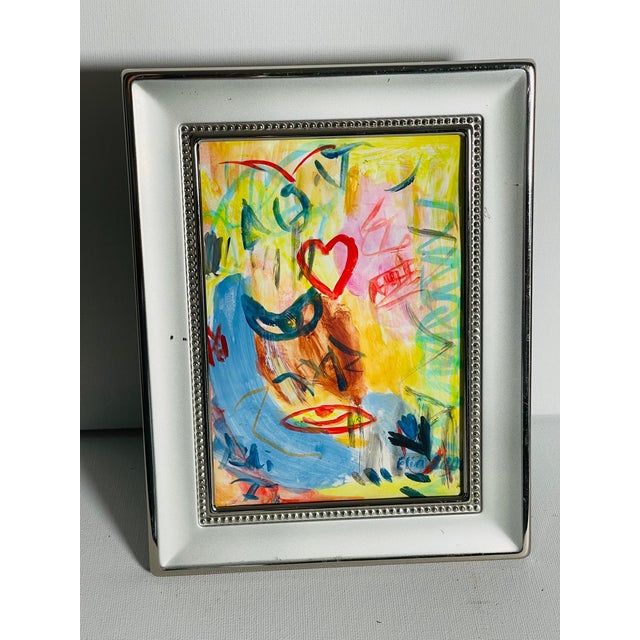 Colourful Lemon Yellow Abstract painting by Elia , framed.