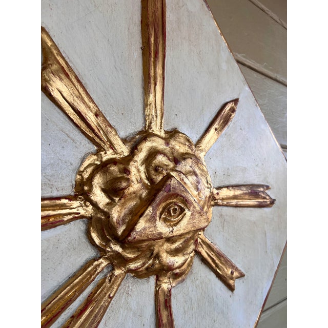 Beautiful detailed Italian baroque style giltwood and painted wall hanging diamond shape framed sunburst panel. The gilt...