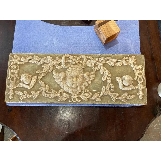 Italian Angel Wall Plaque – Cherub in Plaster and Wood Add a touch of classic Italian charm to your home with this...