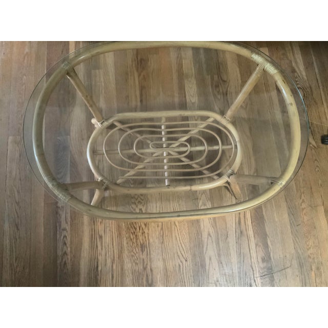 Bamboo rattan oval coffee table with glass top. Boho chic with beautiful design.