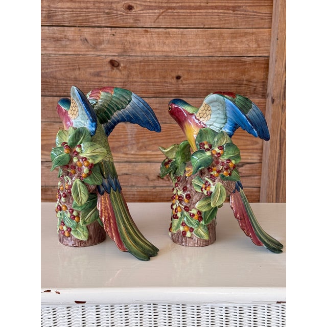 Exceptional pair of vintage hand-painted ceramic parrot figurines by Andrea by Sadek. These beautifully modeled tropical...