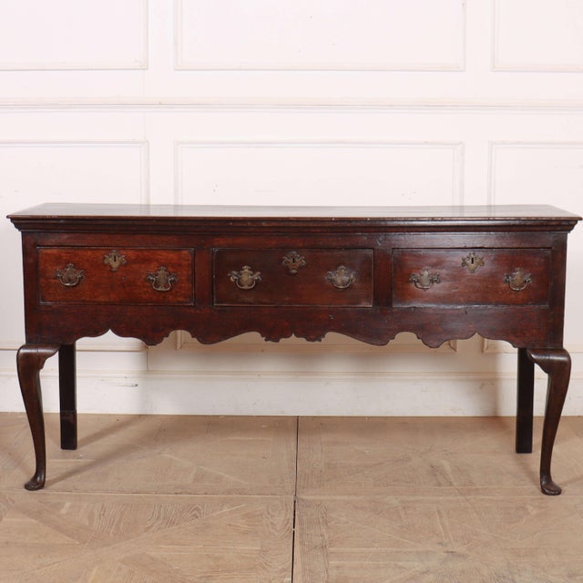 Good 18th C oak cabriole leg dresser base, great colour. 1760 This piece is designed in the style of the selected designer...