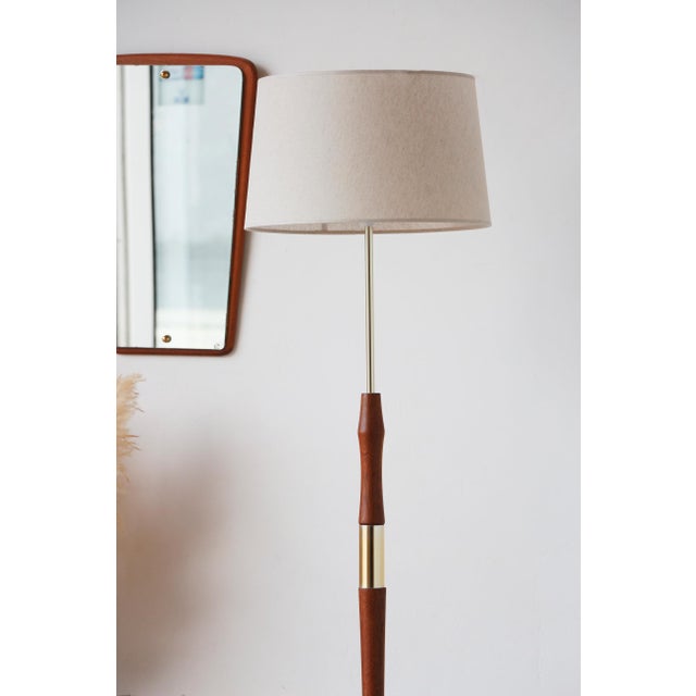 Vintage scandinavian floor lamp in wood and gold brass — beige shade bring timeless elegance and a warm ambiance to your...