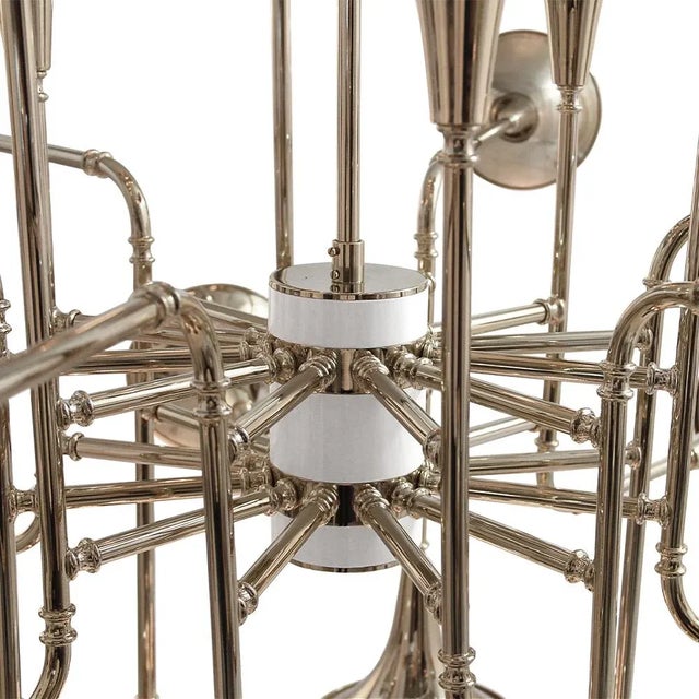 Botti modern chandelier instantly takes us into a music concert starring Chris Botti. The mid-century lighting design was...