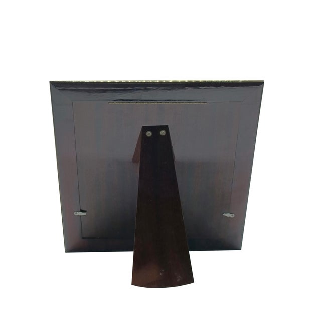 Multi-frame table-top photo frame made entirely of brass, Italian, from the 1970s This piece is designed in the style of...